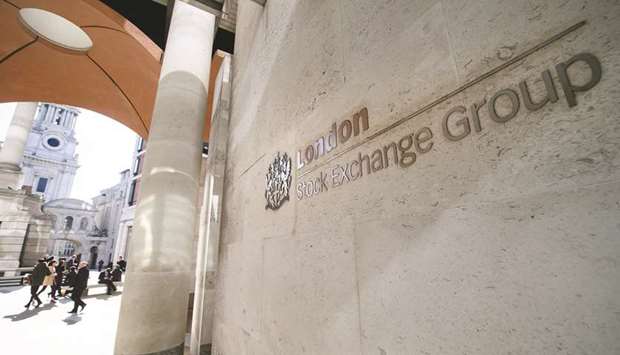 A sign pictured on a wall outside the entrance to the London Stock Exchange. The blue-chip FTSE 100 index closed up 0.4% yesterday after losing as much as 1.2%, taking weekly gains to 1% after two weeks of losses.