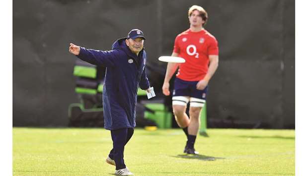 England head coach Eddie Jones throws a frisbee during training in Teddington, Britain, yesterday.