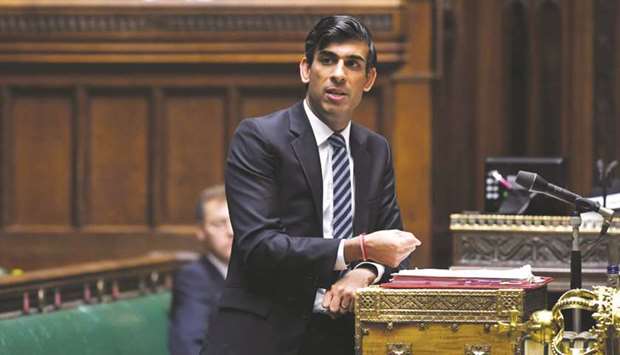Britainu2019s Chancellor of the Exchequer Rishi Sunak speaks at the House of Commons in London yesterday. Sunak told parliament that the government would shoulder more of the burden for paying wages of staff who return part-time to struggling businesses, and would offer more money to hospitality companies and the self-employed.