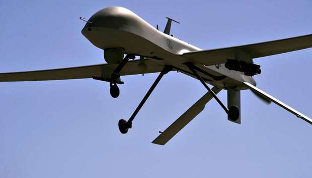 In this US Air Force file photo taken on October 21, 2015 a MQ-1B Predator remotely piloted aircraft flies overhead during a training mission, in Nevada