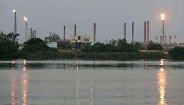 A general view of Abadan oil refinery in southwest Iran, is pictured from Iraqi side of Shatt al-Arab in Al-Faw south of Basra, Iraq