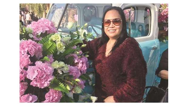 Filipino expatriate Teresita Rivera is a breast cancer survivor.