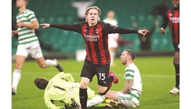 AC Milanu2019s Jens Petter Hauge celebrates his goal during the UEFA Europa League match against Celtic in Glasgow on Thursday. (AFP)