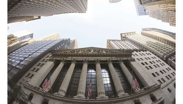 An external view of the New York Stock Exchange. With earnings season in full swing, more companies on Wall Street are again offering earnings guaidance, signalling to investors that some corporations are adapting to uncertainty about a global pandemic that may extend deep into next year.