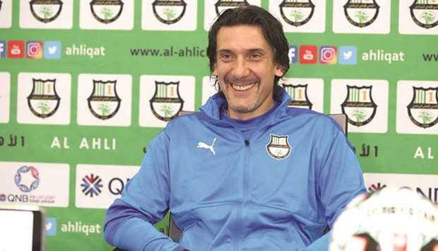 Al Ahli coach Nebosha Jovovic is all smiles as he attends a press conference yesterday.