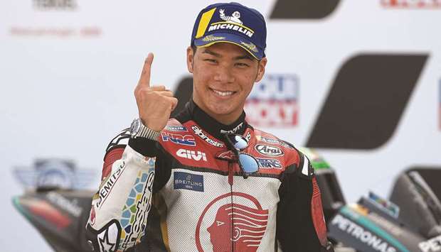 Takaaki Nakagami celebrates after securing the pole position for the MotoGP Grand Prix of Teruel at the Motorland circuit in Alcaniz yesterday.