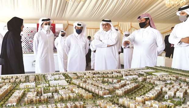 HE Ghanem bin Nasser al-Ali listens to a briefing on Barwa Real Estate's latest projects in Al Wakra city. Looking on are Hassan al-Thawadi, Dr Saad bin Ahmed al-Mohannadi and other dignitaries. PICTURE: Noushad Thekkayil