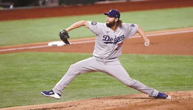 Los Angeles Dodgers starting pitcher Clayton Kershaw pitches against the Tampa Bay Rays during the first inning in game five of the 2020 World Series in Arlington, Texas, USA. (USA TODAY Sports)