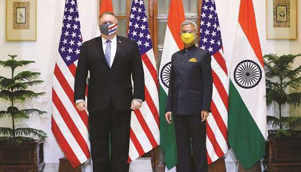 US Secretary of State Mike Pompeo and External Affairs Minister Subrahmanyam Jaishankar stand during a photo opportunity ahead of their meeting yesterday.