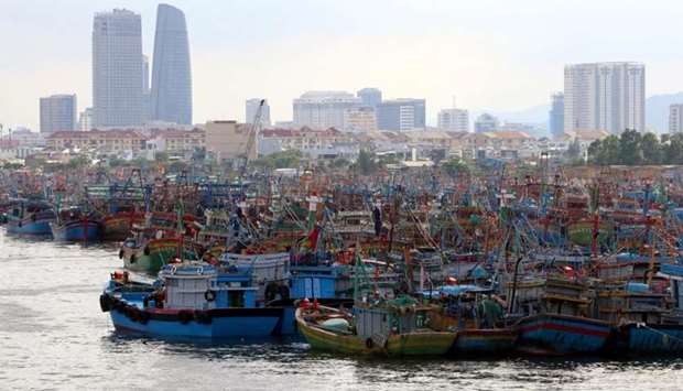 Fishing boats are seen at a port after returning to avoid Molave typhoon in Da Nang city, Vietnam. REUTERS