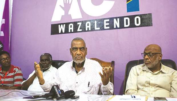 Seif Sharif Hamad (second right), the leader of the opposition, gives a press conference at The Alliance for Change and Transparency (ACT) head office in Stone Town, Zanzibar.