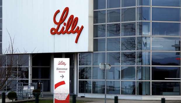 Lilly will start delivering 300,000 doses of the treatment, for which it is being paid $375 million. Pictured: The logo of Lilly is seen on a wall of the Lilly France company unit, part of the Eli Lilly and Co drugmaker group, in Fegersheim near Strasbourg, France