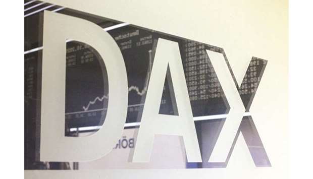 The logo of Germanyu2019s share index DAX is pictured at the Frankfurt Stock Exchange. The benchmark plunged 4.2% to close at 11,560.51 yesterday.