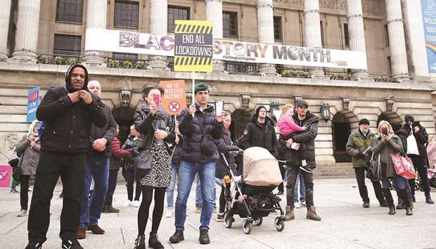 People protest against the coronavirus disease restrictions, in Nottingham, Britain, yesterday.