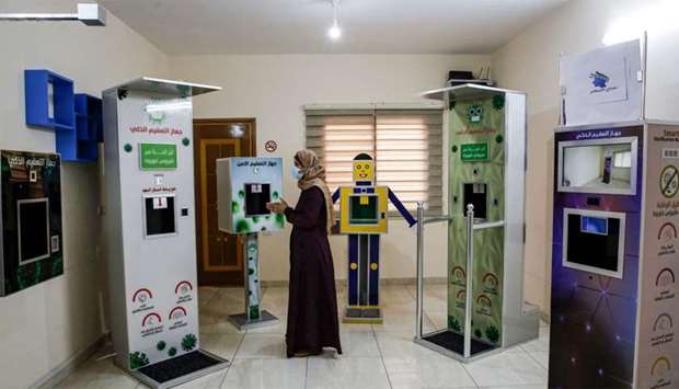 Palestinian entrepreneur Heba al-Hindi demonstrates a locally-designed and manufactured smart sterilisation device in Gaza City