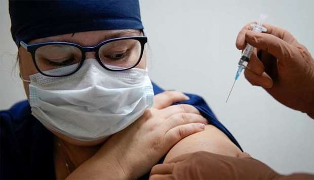 A medic of the regional hospital receives Russia's ,Sputnik-V, vaccine shot against the coronavirus disease (COVID-19) in Tver, Russia