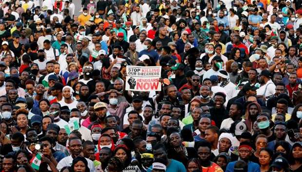 Demonstrators gather during a protest over alleged police brutality in Lagos, Nigeria