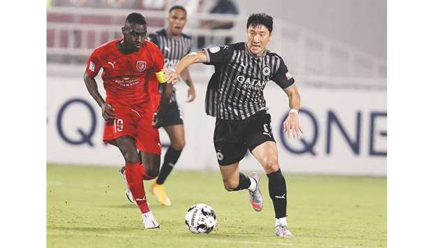 Al Duhail striker and captain Almoez Ali (L) is all geared up for the clash between u201ctwo high-qualityu201d sides.
