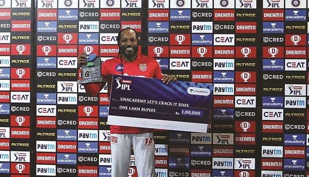 Chris Gayle of Kings XI Punjab receives the Unacademy Letu2019s crack it sixes award in Abu Dhabi yesterday. PICTURE: Sportzpics for BCCI