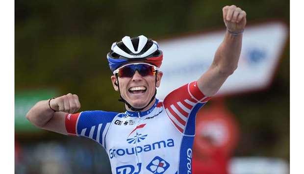 Team Groupama-FDJ rider Franceu2019s David Gaudu celebrates as he crosses the finish-line of the 11th stage of the 2020 La Vuelta cycling tour of Spain, a 170km race from Villaviciosa to Alto de La Farrapona, yesterday. (AFP)