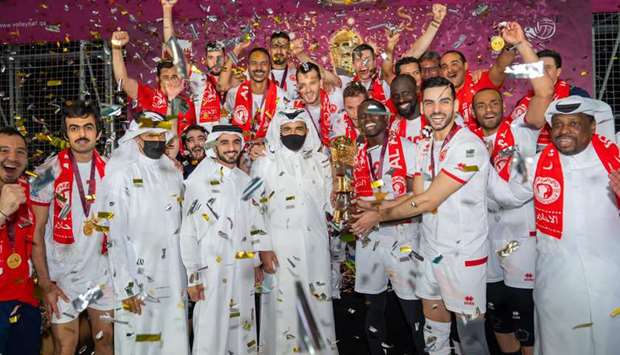 HE Sheikh Joaan bin Hamad al-Thani, President of Qatar Olympic Committee presents the Amir Cup volleyball trophy to Al Arabi players at the Qatar Volleyball Association Hall on Saturday. Al Arabi defeated Police 3-2 in the final to win the prestigious trophy.