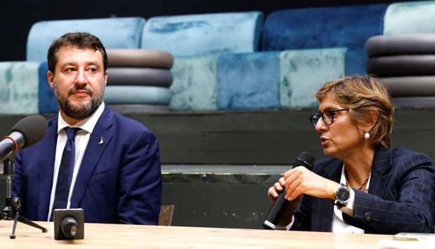 Far-right leader Matteo Salvini and his lawyer, Giulia Bongiorno attend a news conference, in Catania, Italy.