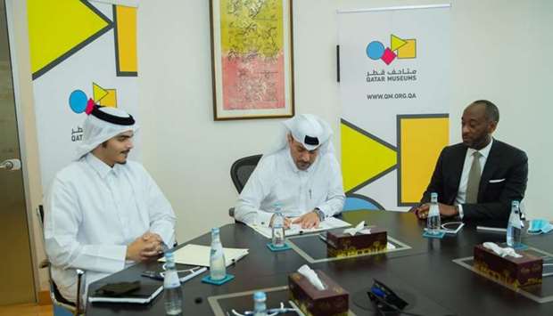 Ahmad Musa al-Namla, CEO of Qatar Museums, with other officials.