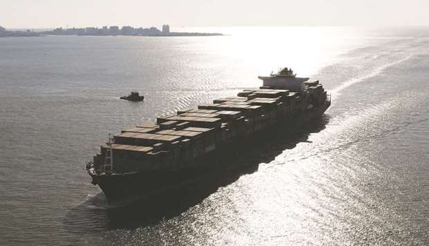 A container ship sails into the New York Harbor (file).