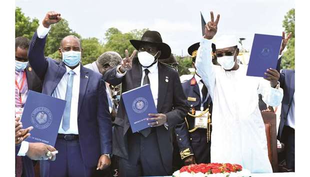 Sudanu2019s Sovereign Council Chief General Abdel Fattah al-Burhan, South Sudanu2019s President Salva Kiir, and Chad President Idriss Deby attend the signing of the peace agreement between the Sudanu2019s transitional government and revolutionary movements to end the decades-old conflict, in Juba, South Sudan, yesterday.