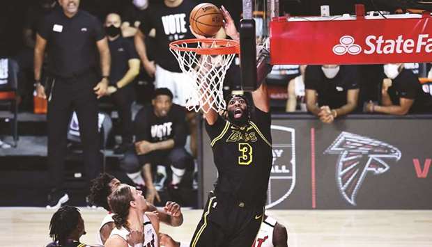 Anthony Davis of the Los Angeles Lakers drives to the basket during the second half against the Miami Heat in Lake Buena Vista, Florida, on Friday.
