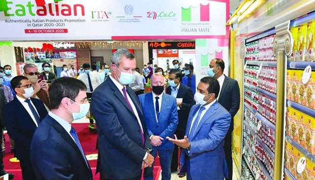 Dr Mohamed Althaf, director of LuLu Hypermarket, Qatar, (right) gestures during a tour of LuLu Hypermarket u2013 Al Messila, where various Italian products are available. Looking on are (from left) ITA trade commissioner Giosafat Rigano, Italian ambassador Alessandro Prunas, and other officials. PICTURE: Noushad Thekkayil