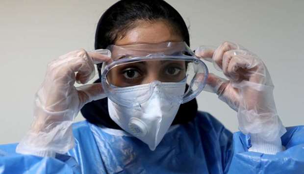 A nurse wearing a protective face mask and gloves looks on at Hazrate Ali Asghar Hospital, amid the outbreak of the coronavirus disease, in Tehran on September 27