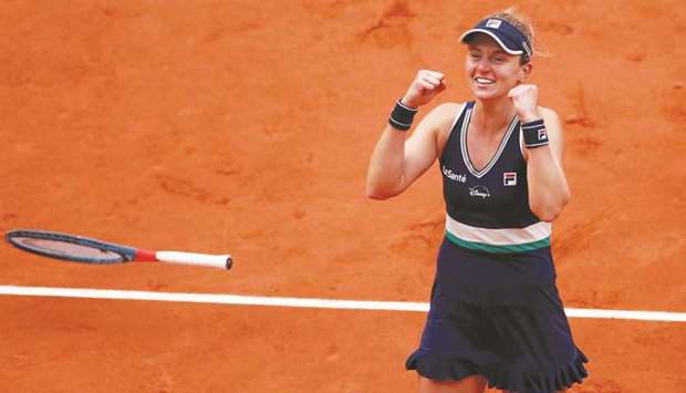 Argentinau2019s Nadia Podoroska celebrates her win in the French Open quarter-final against Ukraineu2019s Elina Svitolina (not pictured) at Roland Garros in Paris, France, yesterday. (Reuters)