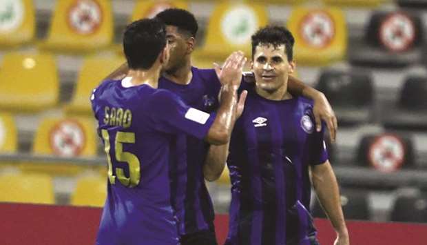 Al Sailiyau2019s Tiago Bezerra (right) celebrates his goal during the Ooredoo Cup match against Al Duhail at Suhaim Bin Hamad Stadium yesterday. (Twitter/QSL)