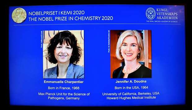 Pictures of Emmanuelle Charpentier and Jennifer A. Doudna, winners of the 2020 Nobel Prize in Chemistry, are displayed on a screen during the news conference announcing the laureates, at the Royal Swedish Academy of Sciences, in Stockholm, Sweden