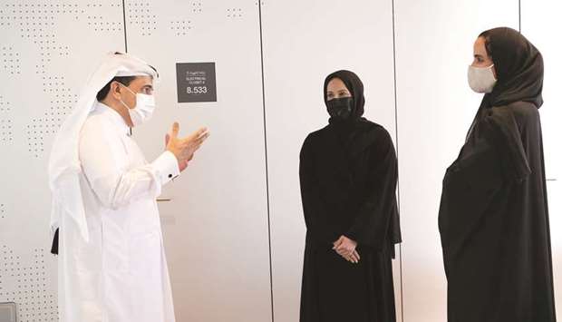 HE Sheikha Hind bint Hamad al-Thani, HE Dr Ali al-Marri and Buthaina Ali al-Nuaimi interact at the s