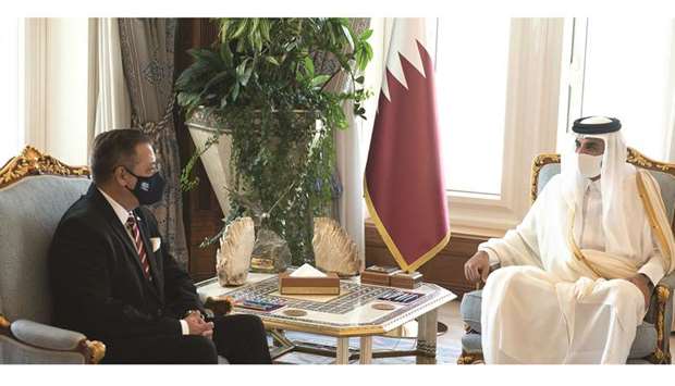 HH the Amir with the outgoing ambassador of Argentina.