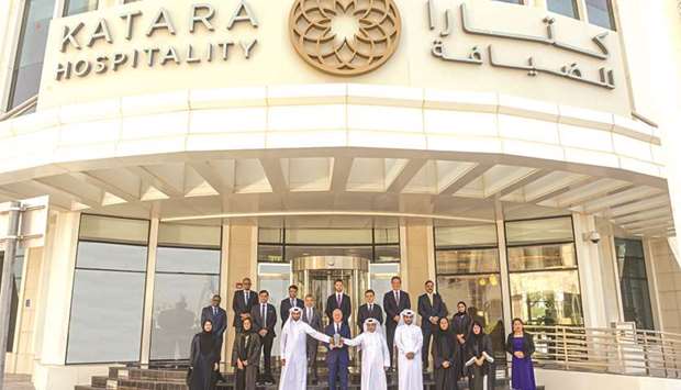 Katara Hospitality officials and employees with the Safety Excellence Award.
