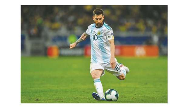 In this file photo taken on July 2, 2019, Argentinau2019s Lionel Messi strikes the ball during the Copa America semi-final against Brazil at the Mineirao Stadium in Belo Horizonte, Brazil. (AFP)