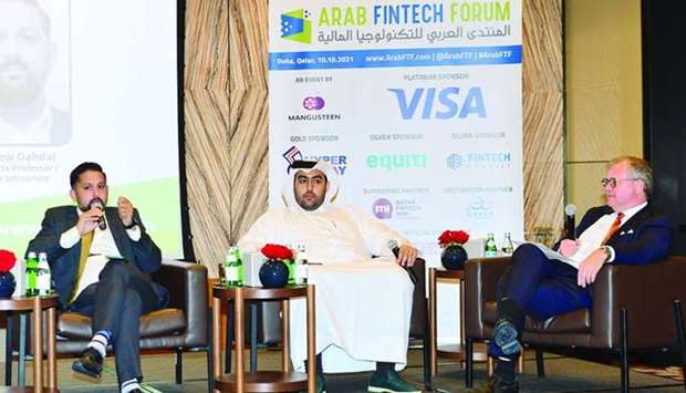 Andrew Dahdal (left), associate professor at Qatar University, gestures during a panel discussion, while Hilal al-Kuwari, senior incubation adviser at QDB, and Henk Jan Hoogendoorn, chief of Financial Sector at QFCA, look on. PICTURE: Shaji Kayamkulam