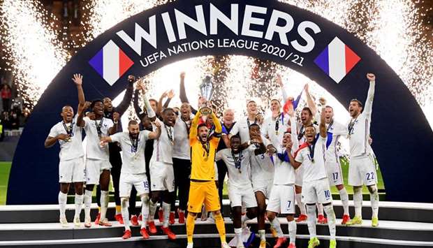 Franceu2019s Hugo Lloris lifts the trophy as they celebrate after winning the Nations League.