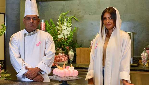 A special pink cake has been created in collaboration with Muna Al Sulaiti, with proceeds going to the Qatar Cancer Society