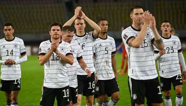 Germany players celebrates after winning the FIFA World Cup Qatar 2022 qualification Group J football match between North Macedonia and Germany at the Toshe Proeski National Arena in Skopje. AFP