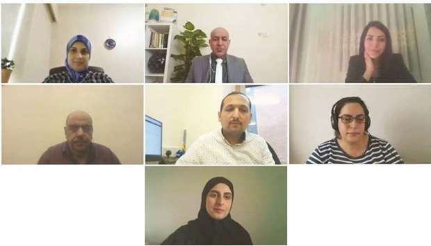 The moderator and panellists, including student Fatima al-Sadi.