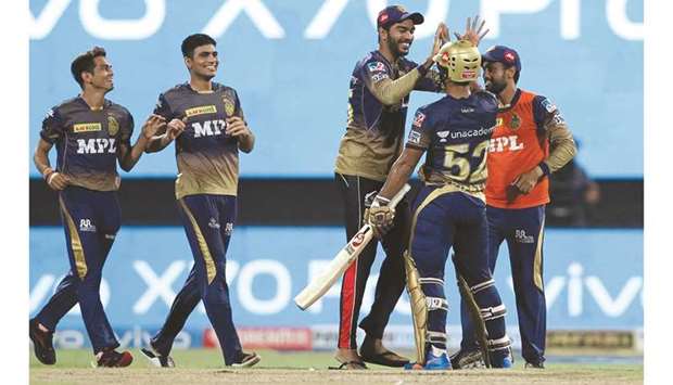 Rahul Tripathi of Kolkata Knight Riders (second right) celebrates with teammates after winning the Qualifier 2 of the IPL against the Delhi Capitals at the Sharjah Cricket Stadium in the United Arab Emirates yesterday. (Sportzpics for IPL)