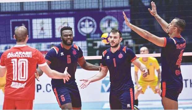 Al Arabi players celebrate after winning a point against Burevestnik Almaty in the semi-finals of the Asian Club Volleyball Championship in Thailand on Thursday.