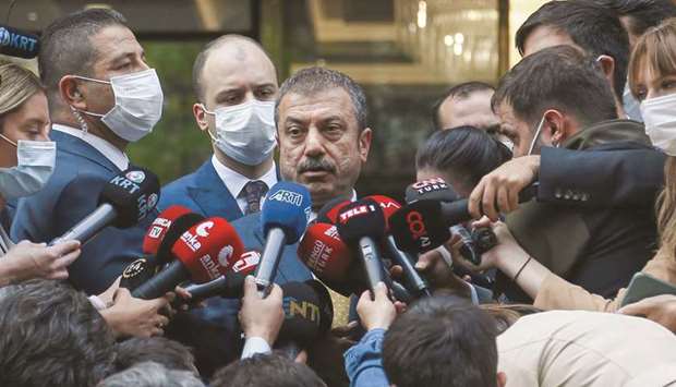 Turkish central bank governor Sahap Kavcioglu speaks to the media in Ankara on October 15. Kavcioglu said the bank would consider domestic and international developments before making a rate decision at the next MPC meeting on October 21 and would make u201cthe most correct decisionu201d.