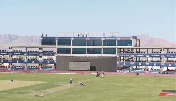 Workers prepare the Al Amerat Cricket Stadium in Omanu2019s capital Muscat yesterday. (AFP)