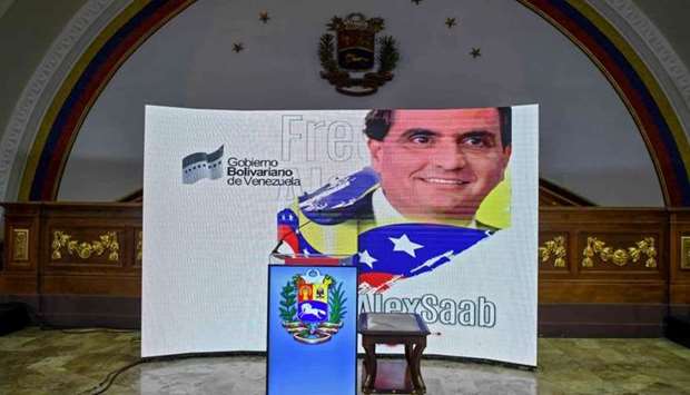 Colombian businessman Alexander Saab is projected on a screen at the National Assembly, in Caracas yesterday. Federico Parra/AFP
