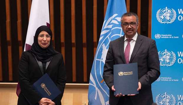 Dr Tedros Adhanom Ghrebreyesus, WHO Director-General and HE the Minister of Public Health Dr Hanan Mohamed Al Kuwari after signing the agreement.